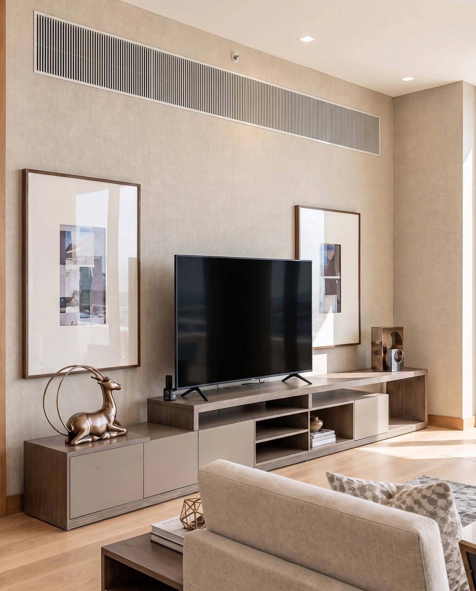 Bvlgari Residences I — Bespoke media joinery integrates display, storage and technology within a precise composition.